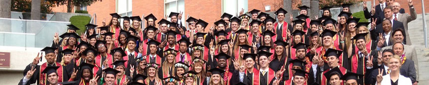 students wearing graduation sashes